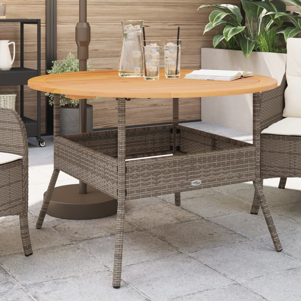 Tuintafel met acaciahouten blad Ø110x71 cm poly rattan zwart